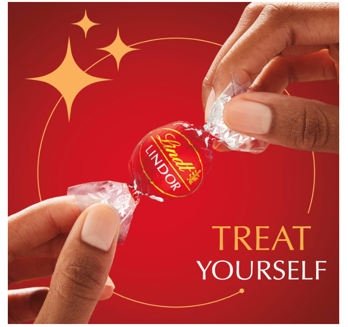 Lindt LINDOR Milk Chocolate Candy Truffles, 15.2 oz. Bag